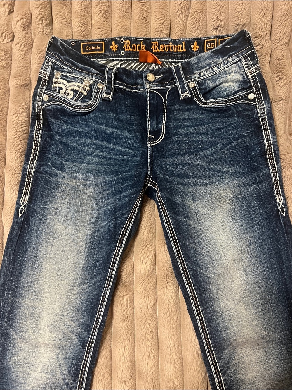 Rock Revival Women's Skinny Jeans in Distressed Dark Blue with White Stitching